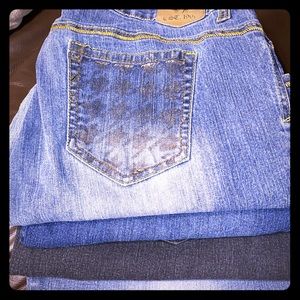 Woman’s lot of jeans